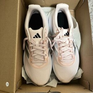 adidas Pink Athletic Shoes with Breathable Mesh and Sleek Design